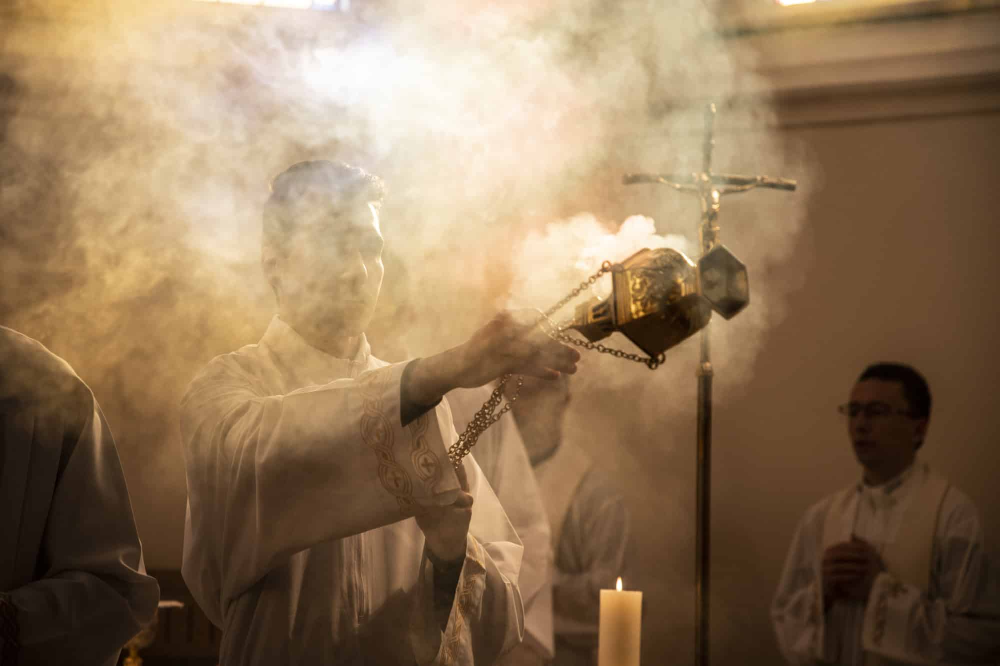 Image of incense at Mass. Discover the meaning of the Eucharist, Mass, and our participation in it in our article on the 100 Saint quotes about the Catholic Mass. Find Mass, adoration, and confession schedules near you on the Catholic Mass Times app on your cell phone.